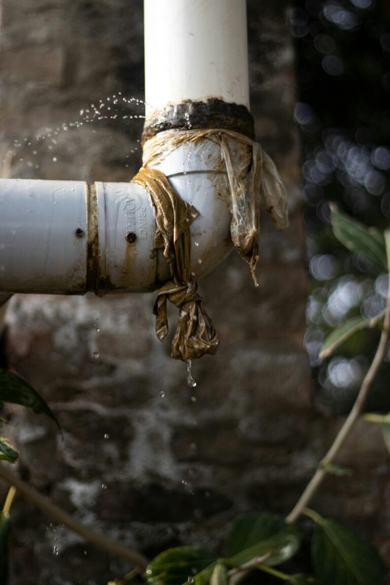 leaking PVC plumbing pipe showing home maintenance issue in Oklahoma property inspection