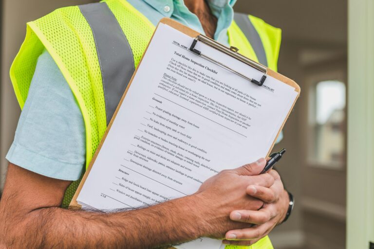 home inspector examining a house during a home inspection in Oklahoma