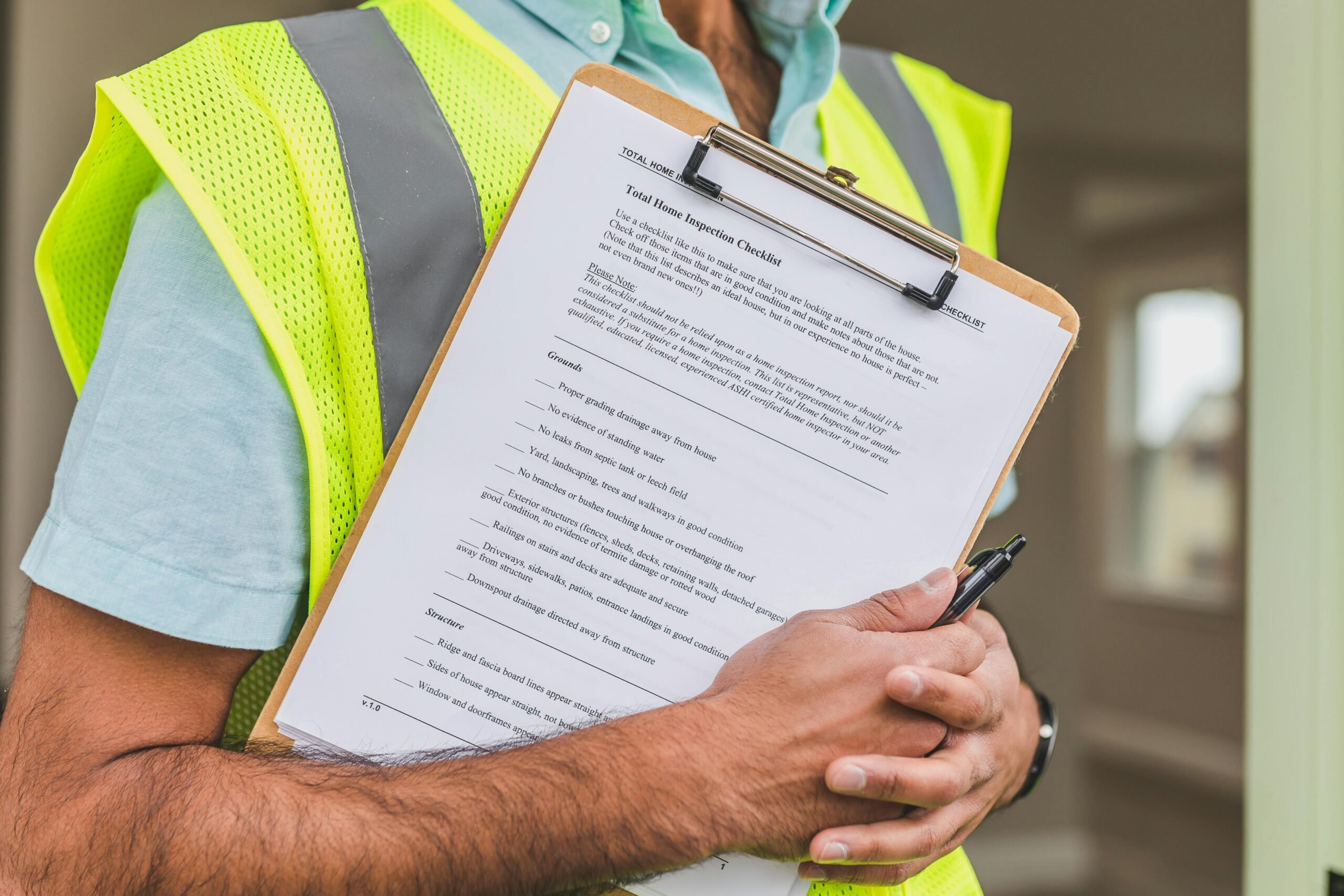 home inspector examining a house during a home inspection in Oklahoma