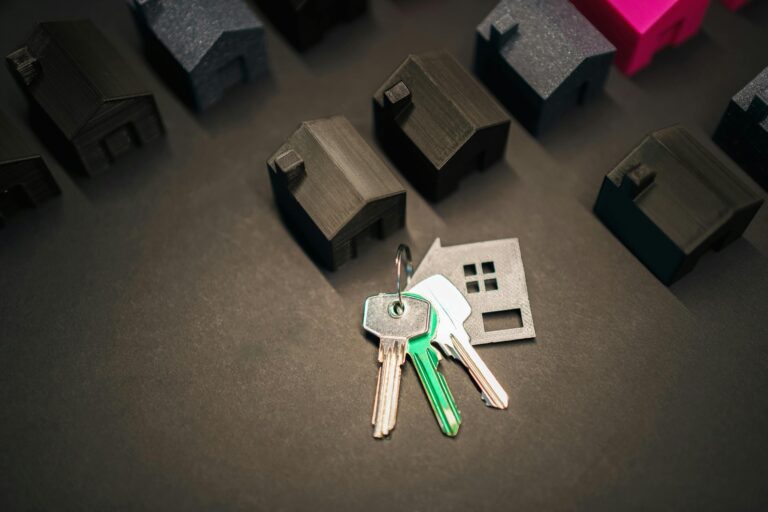 House keys on real estate purchase contract representing closing costs in Oklahoma