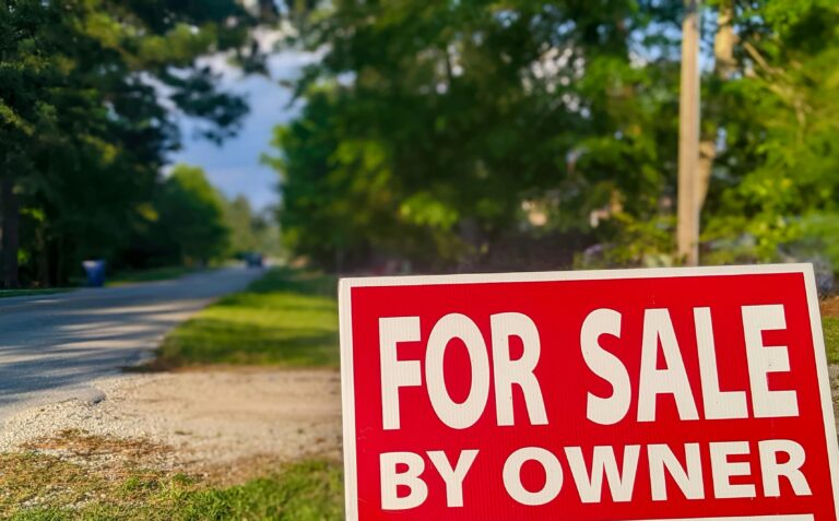 home with for sale sign representing using a real estate agent to sell a house in Oklahoma